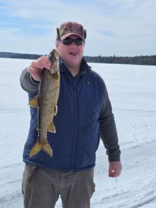 Image of a 18-inch lake trout caught while fishing in Harmony
