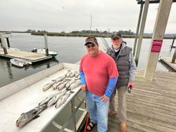 Two anglers enjoying a day of fishing in Darien