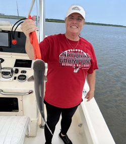 A person fishing in Darien