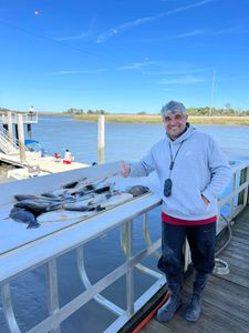 A person fishing in Darien