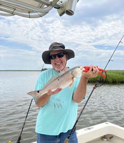 Angler with a redfish in GA