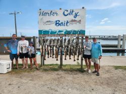 Group of 5 people enjoying a fishing trip in TX