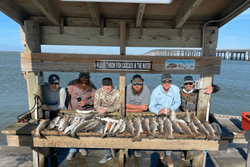 Group of 6 people fishing in TX