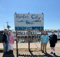Harbor City Bait sign displaying caught fish from Rockport TX fishing trip