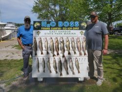 Anglers fishing at lakeside in Marblehead with 11 fish caught