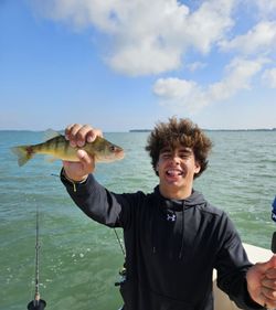 Angler fishing at the lakeside in Marblehead