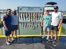 Four people fishing at Lakeside Marblehead