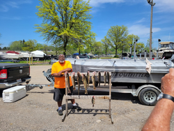 Fisherman holding a rod and reel in Lorain