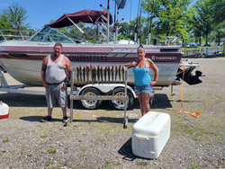 Three people enjoying a fishing and hunting adventure in Lorain