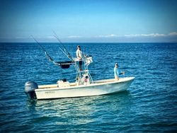 Two people enjoying fishing tours on Harkers Island