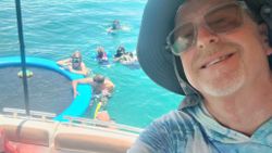Snorkeling tour in crystal clear turquoise waters near Lake Park FL with multiple participants exploring underwater