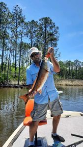 Angler holding a 21-inch fish in FL