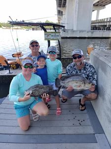 Two anglers enjoying their fishing trip in Panama City
