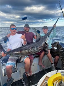 Three people fishing in FL