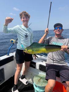 Successful mahi mahi fishing catch on boat in Lantana FL waters