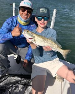 Two people fishing in FL