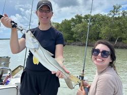 Two people fishing in Homestead