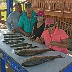 Two anglers fishing in Port Mansfield