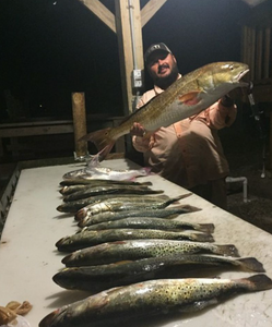 2 fishing rods with a huge 34-inch catch at Port Mansfield