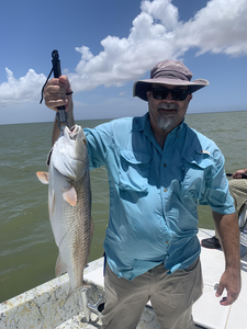 Reeling in the reds with some deep sea magic in Port Mansfield!