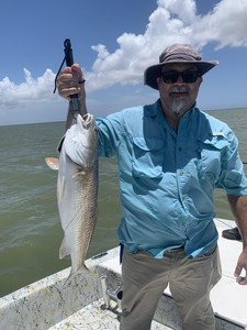 Reeling in the reds with some deep sea action in Port Mansfield!