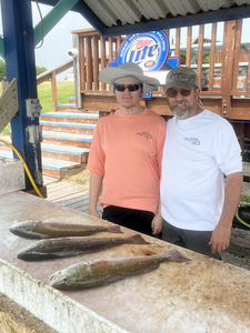 Big redfish reeled in during a light tackle adventure!