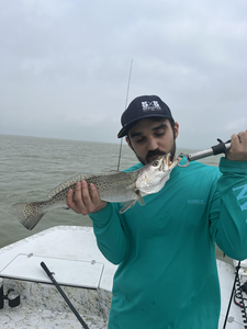 Reeling in the spots with deep sea bait casting!