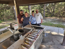 Four anglers enjoying a fishing adventure in the Northeast