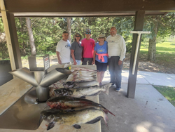 Two big fish being caught while fishing and hunting in the NE location