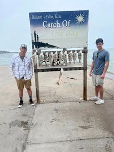 Two people fishing in Rockport