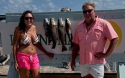 Two anglers fishing for redfish in Rockport