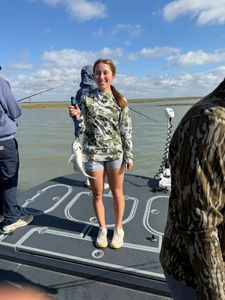 Fishing boat deck in Rockport TX waters with caught fish displayed