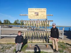 Two anglers on a boat in Ohio enjoying fishing cruises