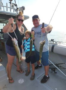 Three anglers with a fishing haul in Conneaut