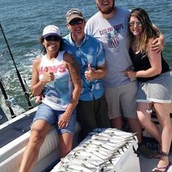 Four people enjoying fishing in North Carolina