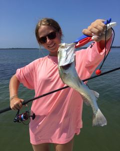 Several good Specks landed by this young lady today while fishing St Joseph Bay with Captain Mitch