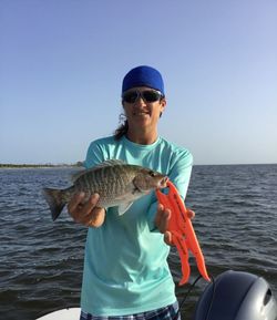 A lone angler fishing in the waters of Florida