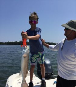 Two anglers enjoying a fishing trip in FL