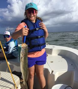 A couple enjoying a fishing trip in FL
