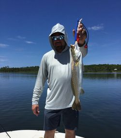A person fishing in FL