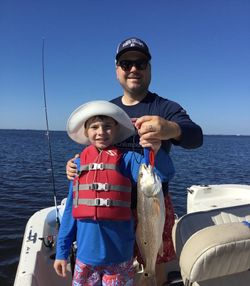 Two people fishing in FL