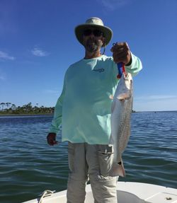 A person fishing in Florida
