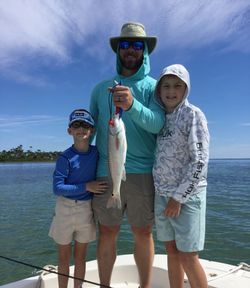 Three people fishing in Florida