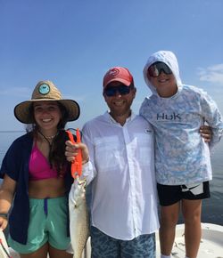 Three people fishing in Florida