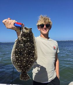 Image of a summer flounder being caught while fishing in Florida