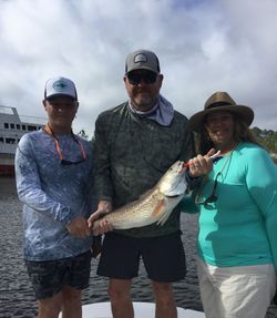 Three people fishing in Florida