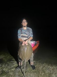 Angler with a 31-inch fish in Fritch