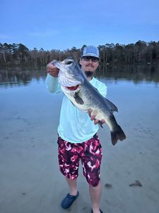 Fisherman holding a big fish in Fritch