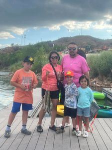 5 people enjoying fishing trip in TX
