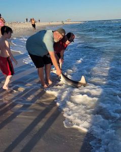 Two people enjoying a great fishing trip in Pensacola